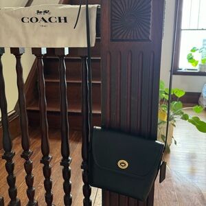 Coach turn lock mini leather pouch crossbody